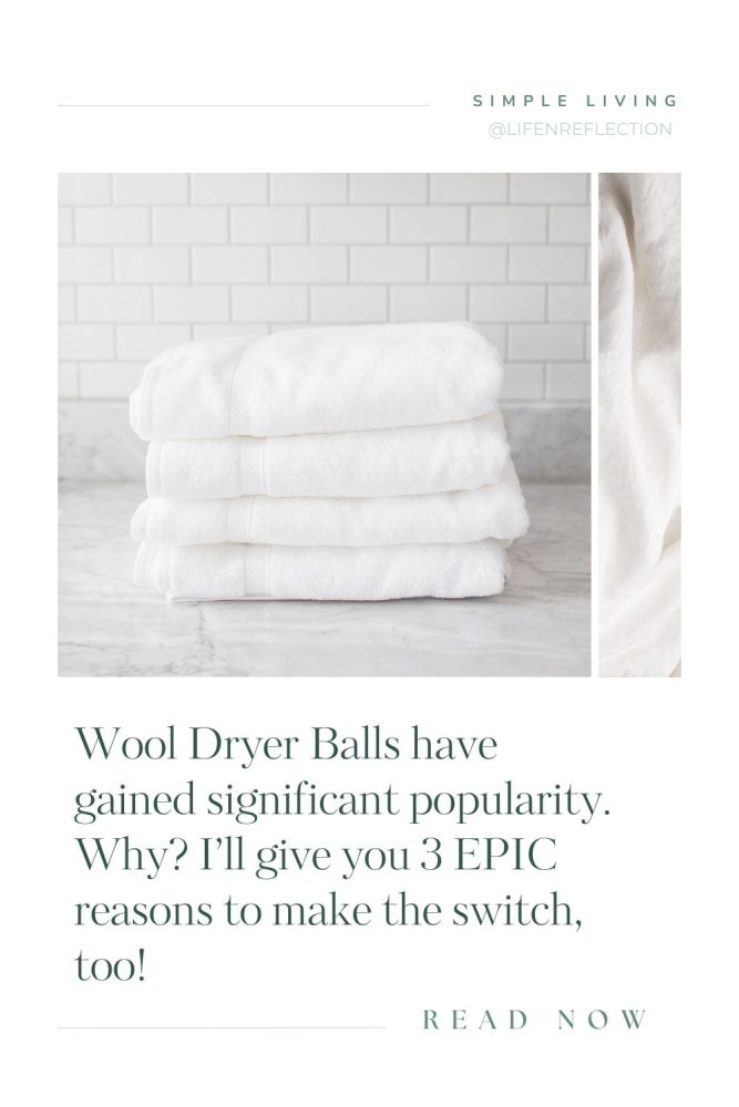 stack of freshly laundry white bath towels on a marble counter