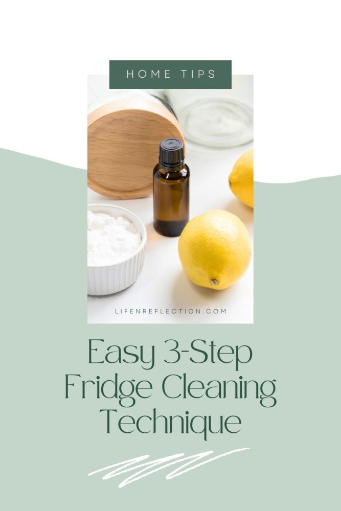 Close up of fresh yellow lemons, a dark bottle of essential oil and a white bowl of baking soda with text that reads home tips easy 3 step fridge cleaning technique.
