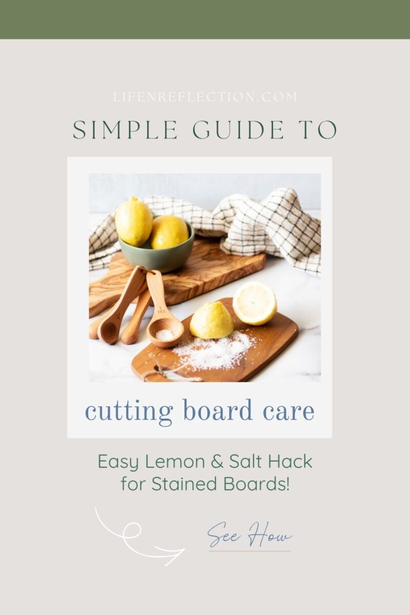 wood cutting boards and measuring spoons next to lemons and kitchen towel with half a lemon and salt spread on a board