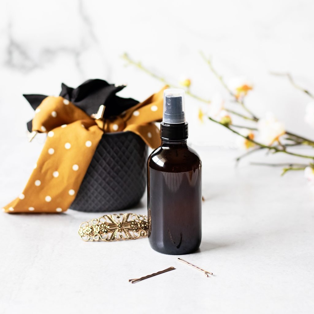 Skip your messy volumizing powder and swap for an easy volumizing spray made with aloe vera and castor oil!