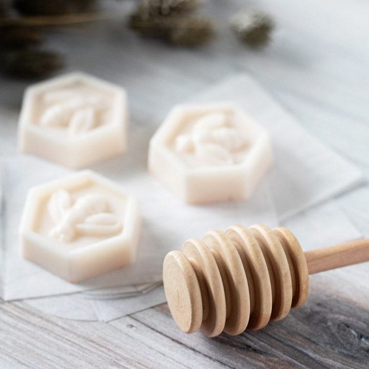 This honey and goat milk soap recipe makes easy handmade gifts for friends. The finished soaps have a classic bumble bee and honeycomb shape that makes each look expensive and elegant.