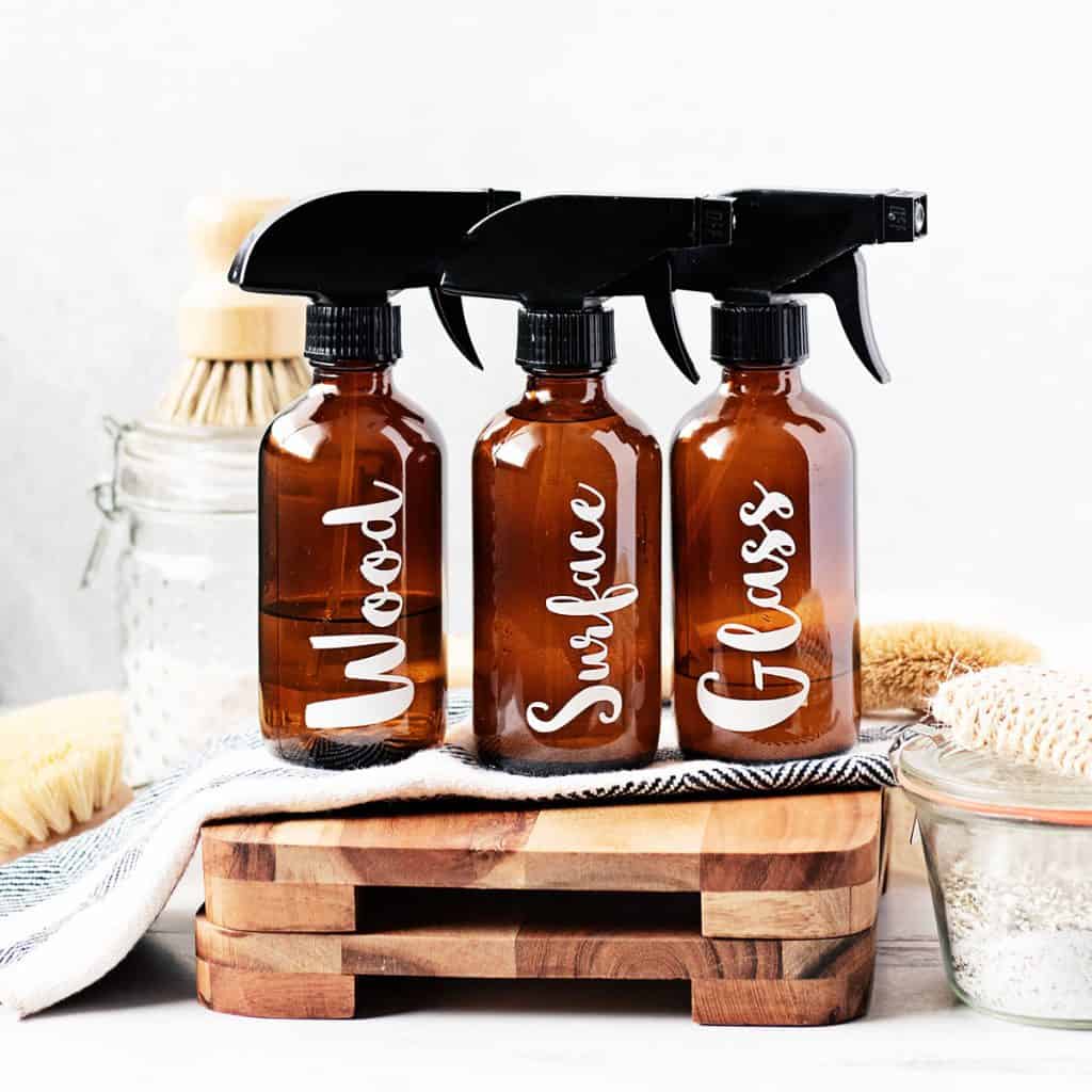 amber glass bottles of homemade cleaners