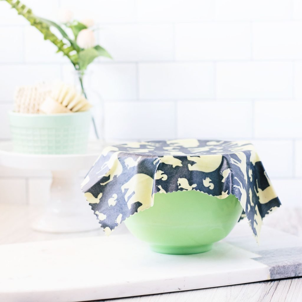 I gotta say our DIY beeswax wraps have been a real game changer for simple living. Since figuring out how to make beeswax wraps I’ve reduced a lot of waste in our home and actually saved some space in our pantry too.
