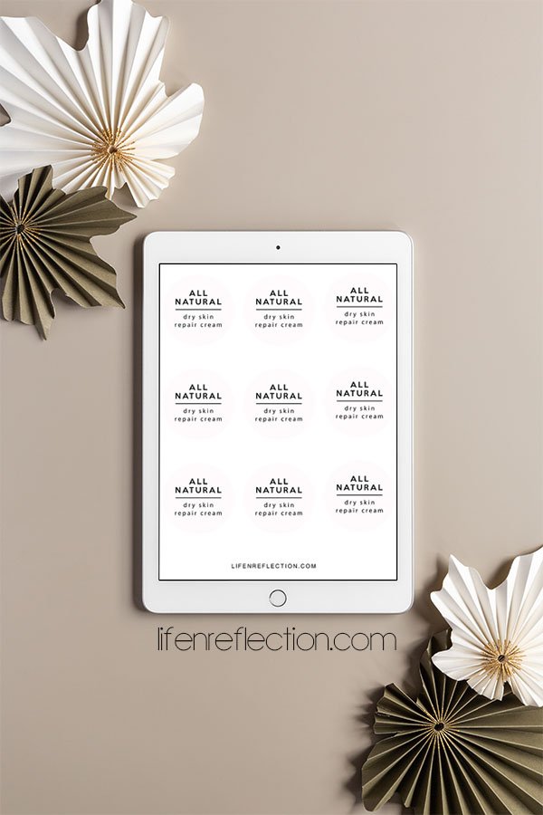 white ipad showing printable labels on a tan background