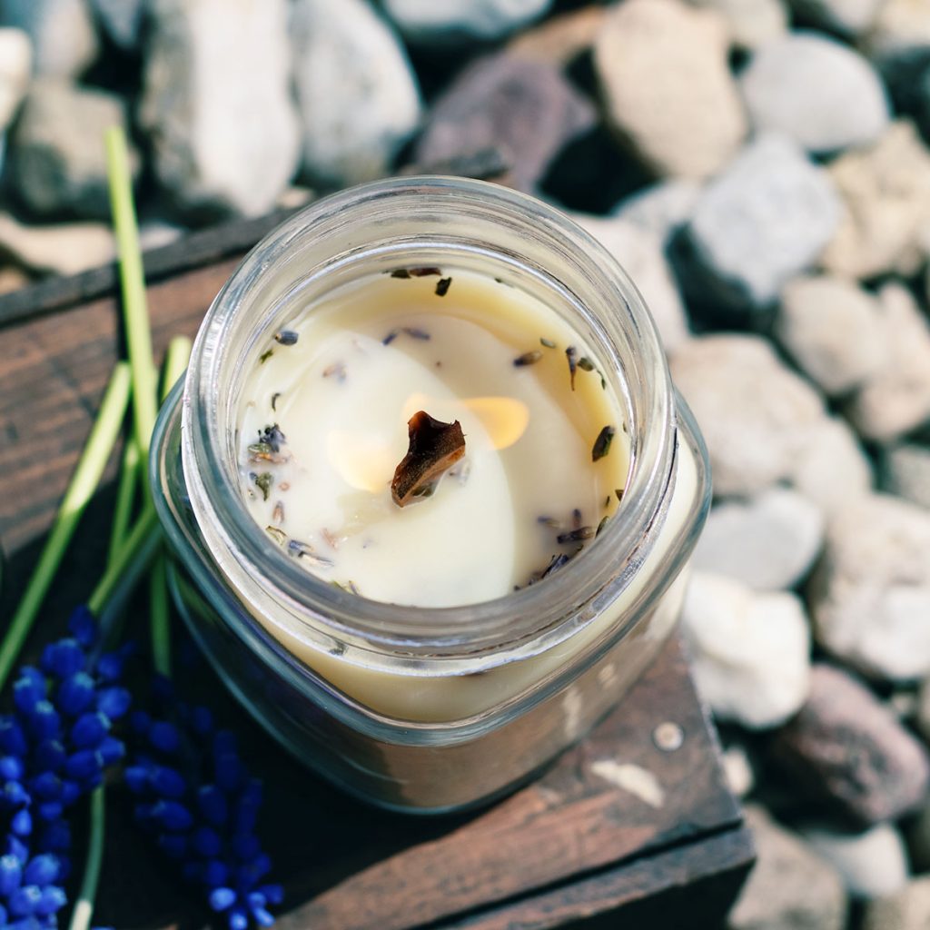 DIY citronella candles are far more effective than “citronella-scented" candles that are commonly marketed in outdoor patio displays in stores. The effectiveness comes from using real ingredients, such as citronella essential oil.