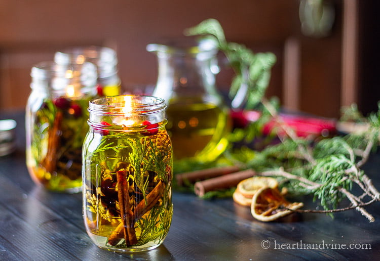 If you are looking for Christmas handmade candles that also fill the air with an aromatic effervescence even when not lit, then this mason jar oil candle lamp definitely tops the list.