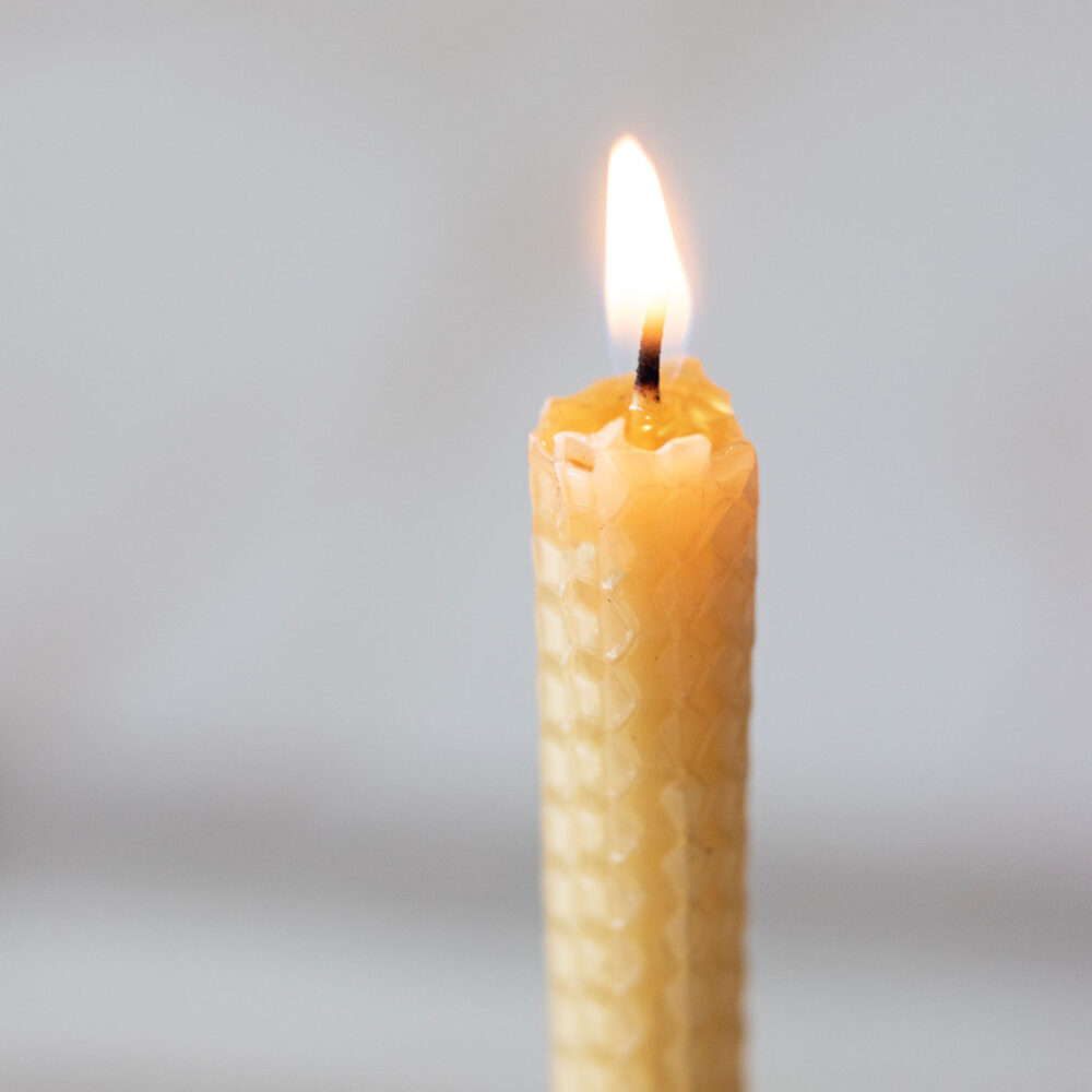 This rolled beeswax candle is the hassle-free way to make tall beeswax candles that last.