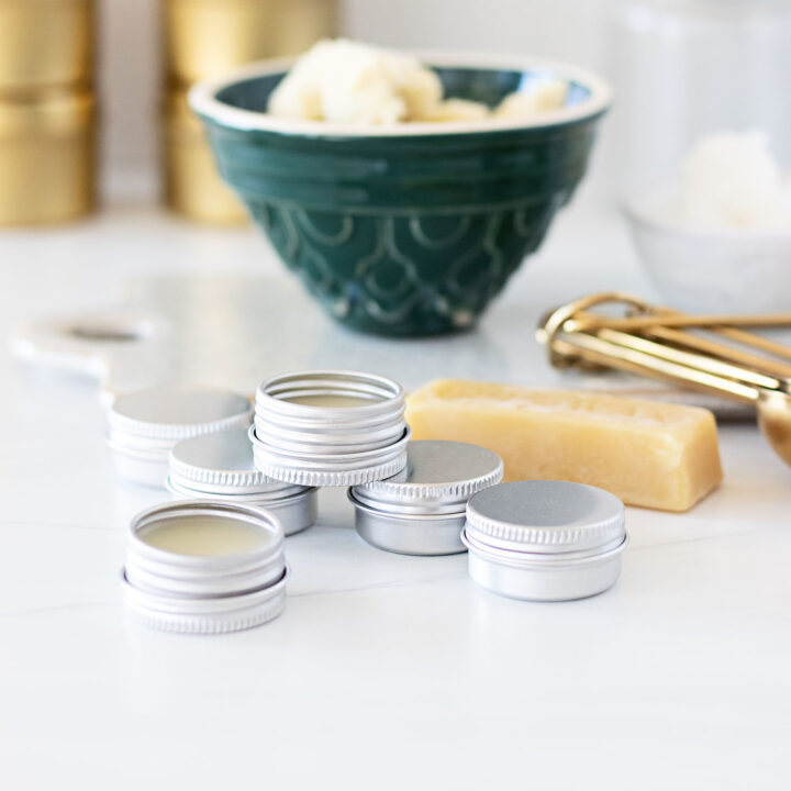 Follow our zero waste lip balm recipe to make lip balm with three ingredients for lip balm tins. It’s a simple, natural lip balm recipe made with shea butter.