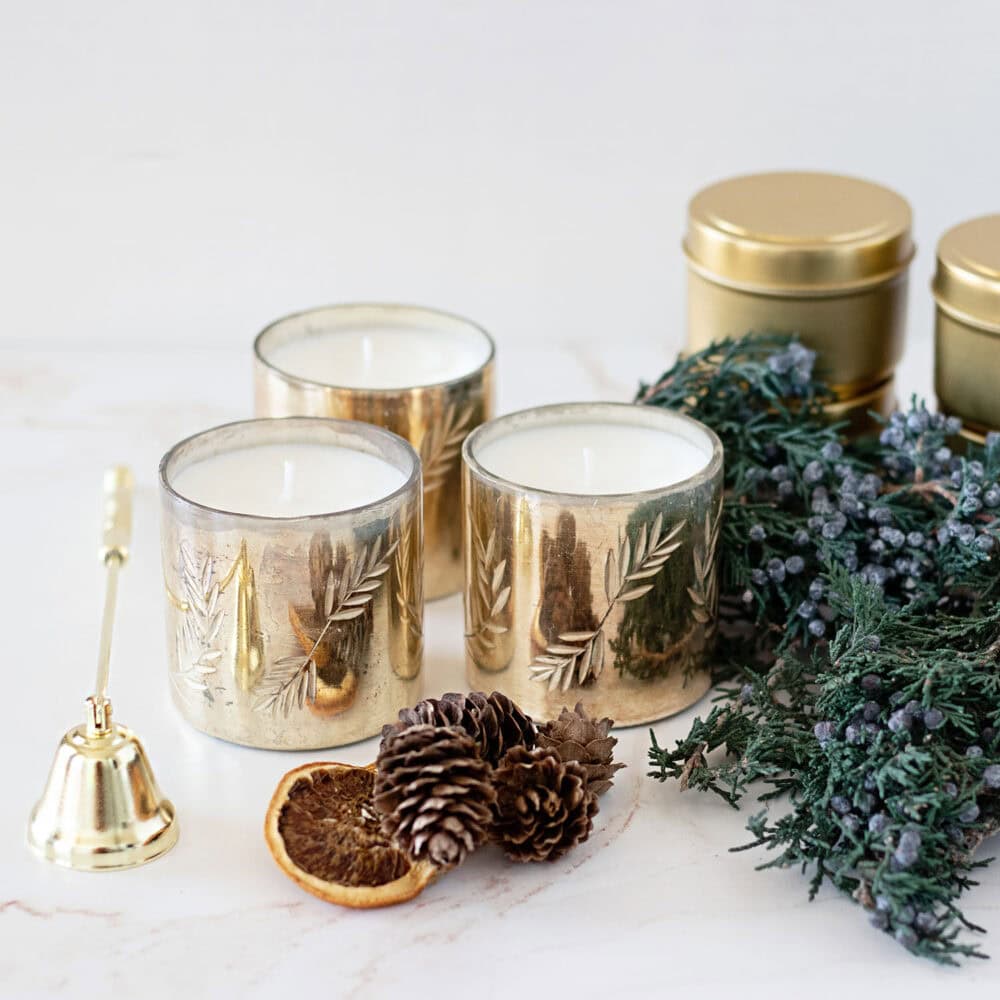 Discover the best Christmas candle scent recipes for DIY candles in easy to use printable candle scent mixing charts! These Christmas scented candle recipes are anything but basic.