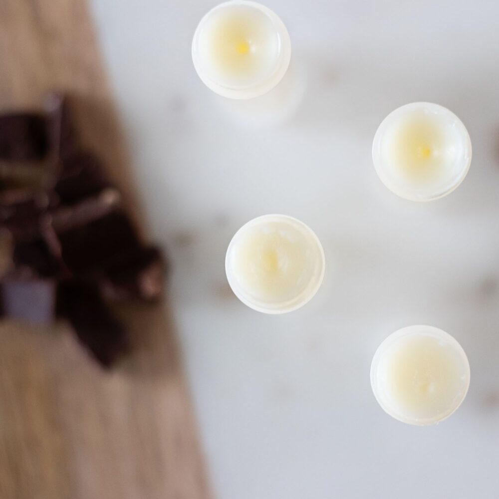 This chocolate lip balm recipe is dessert-worthy and made with the real deal for creamy, chocolaty smooth lips.