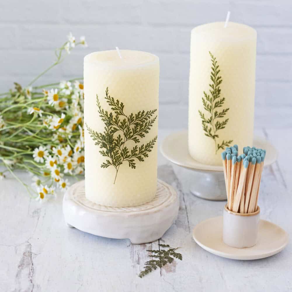 Add an outdoor touch to your home decor by creating these pressed leaf candle pillars with my easy-to-follow tutorial.