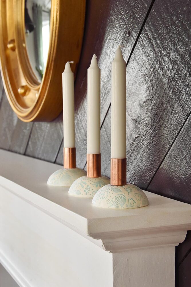I came across this idea to make a set of clay candle holders using a printed clay technique combined with copper pipe pieces.