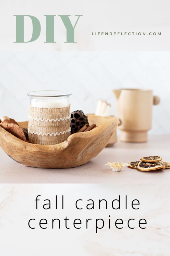 fall candle wrapped in burlap inside a wood bowl
