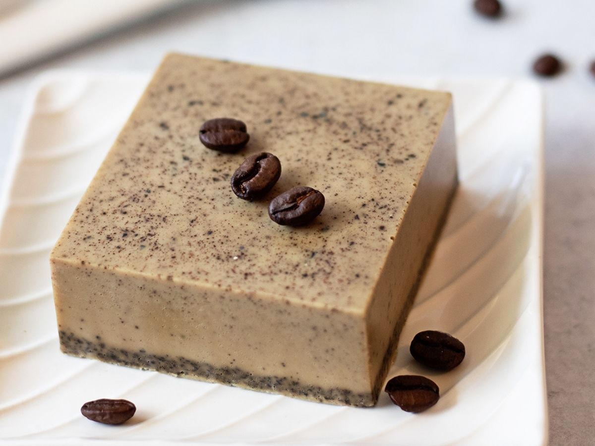 brown coffee soap bars textured with real coffee grounds on a white surface