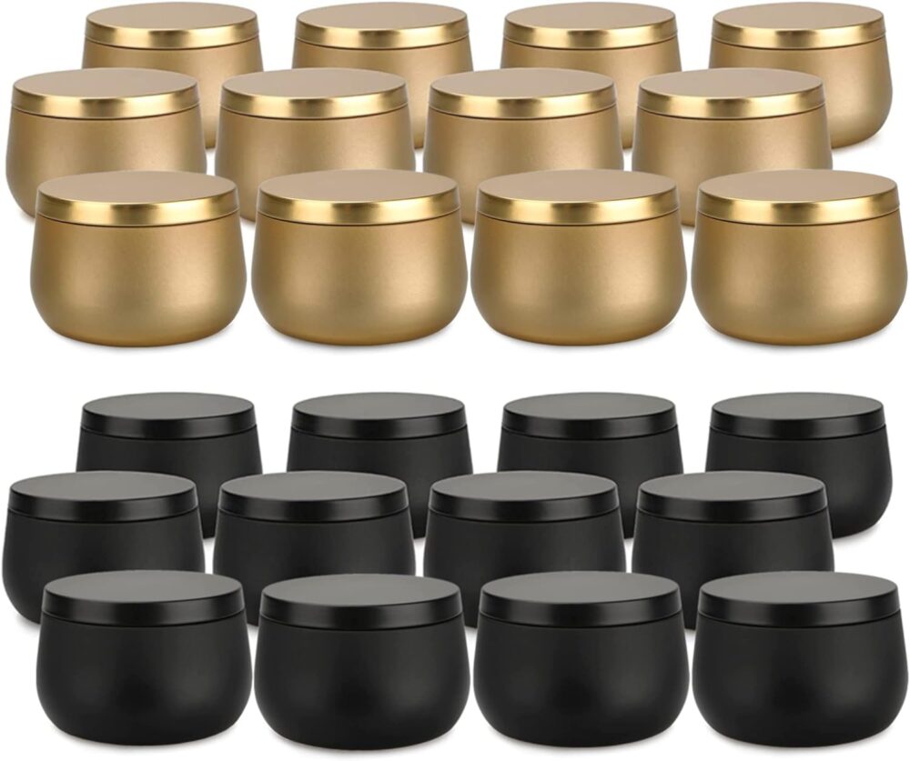 gold and black metal candle containers