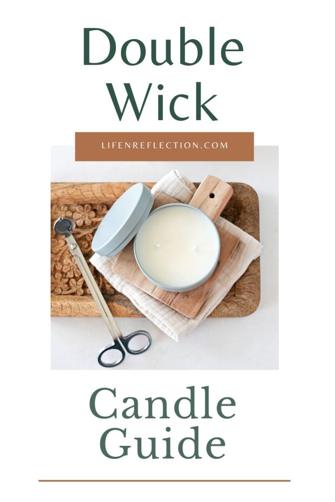 Looking down at an open candle tin of a double wick candle.