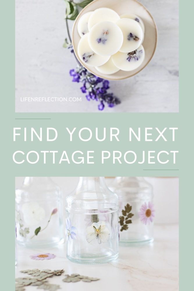 circle shaped white soy wax melts with purple flowers inside next to a purple boom and glass vases with pastel color pressed flowers