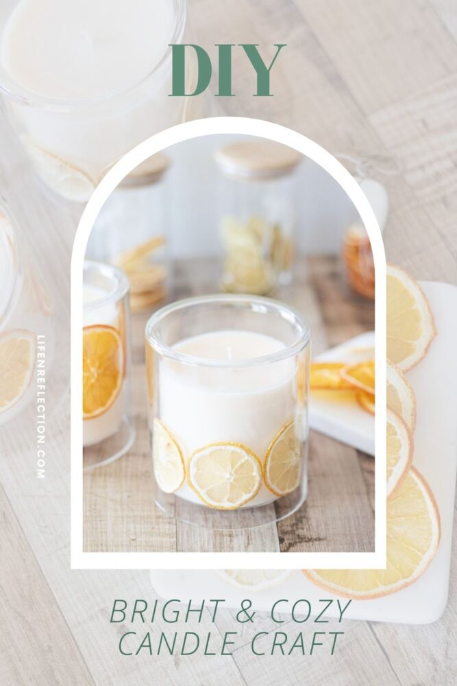 Close up of a soy wax diy dried citrus candle wrapped with lemon slices